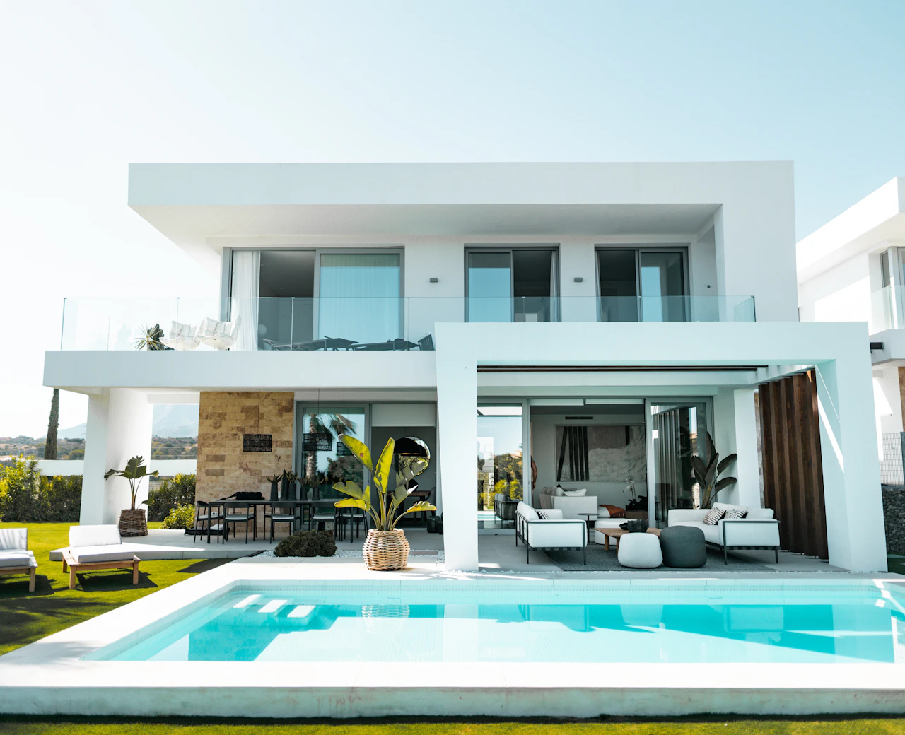 A light-filled villa with a swimming pool; illustrative photograph
